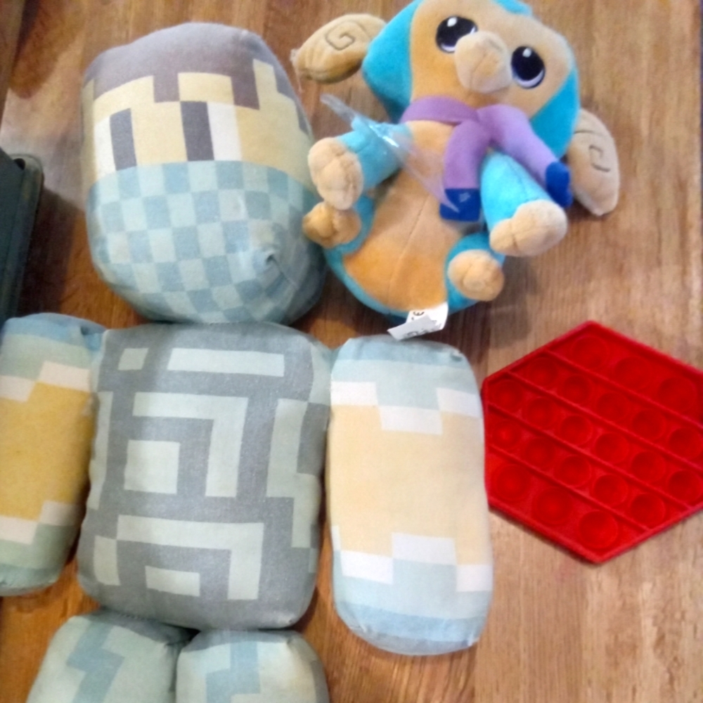 Video game plushies and pop it